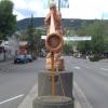 Carving of an Alpenhorn Player welcomes you to Main Street